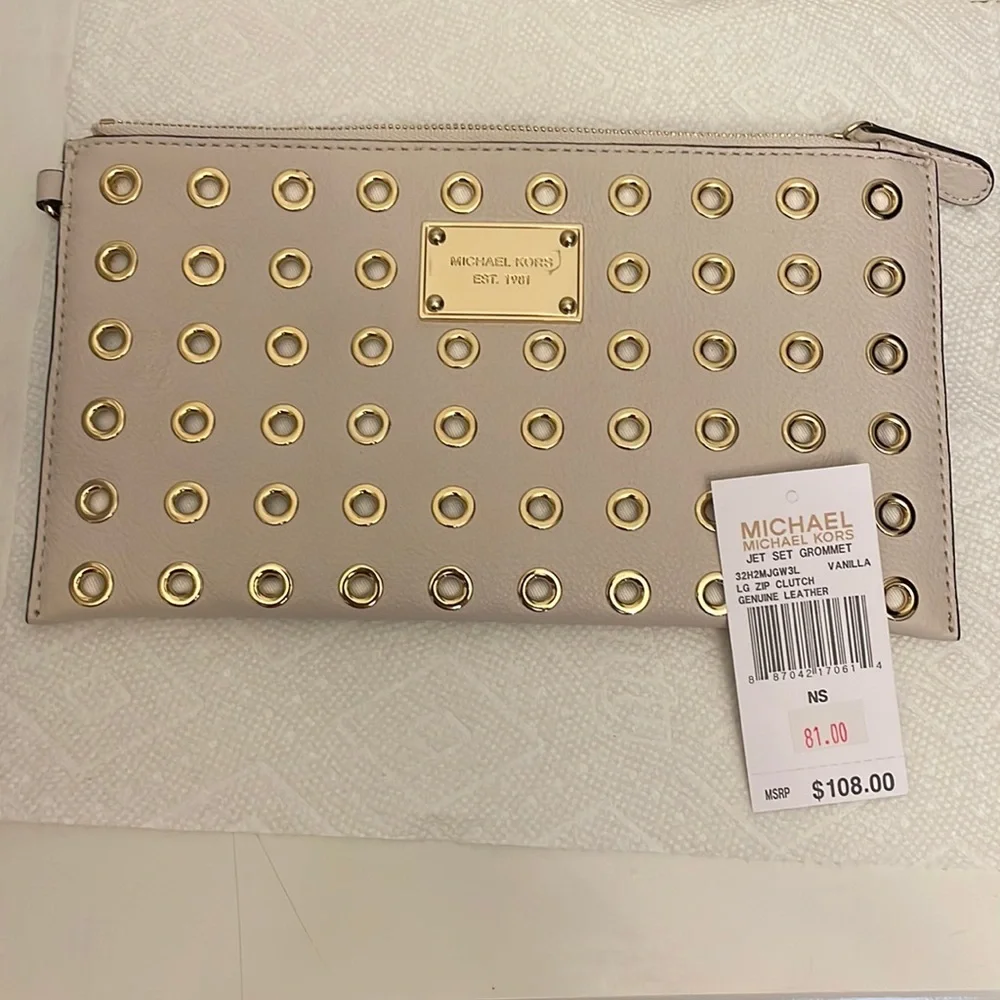 NWT Michael Kors leather  grommet zip clutch.
